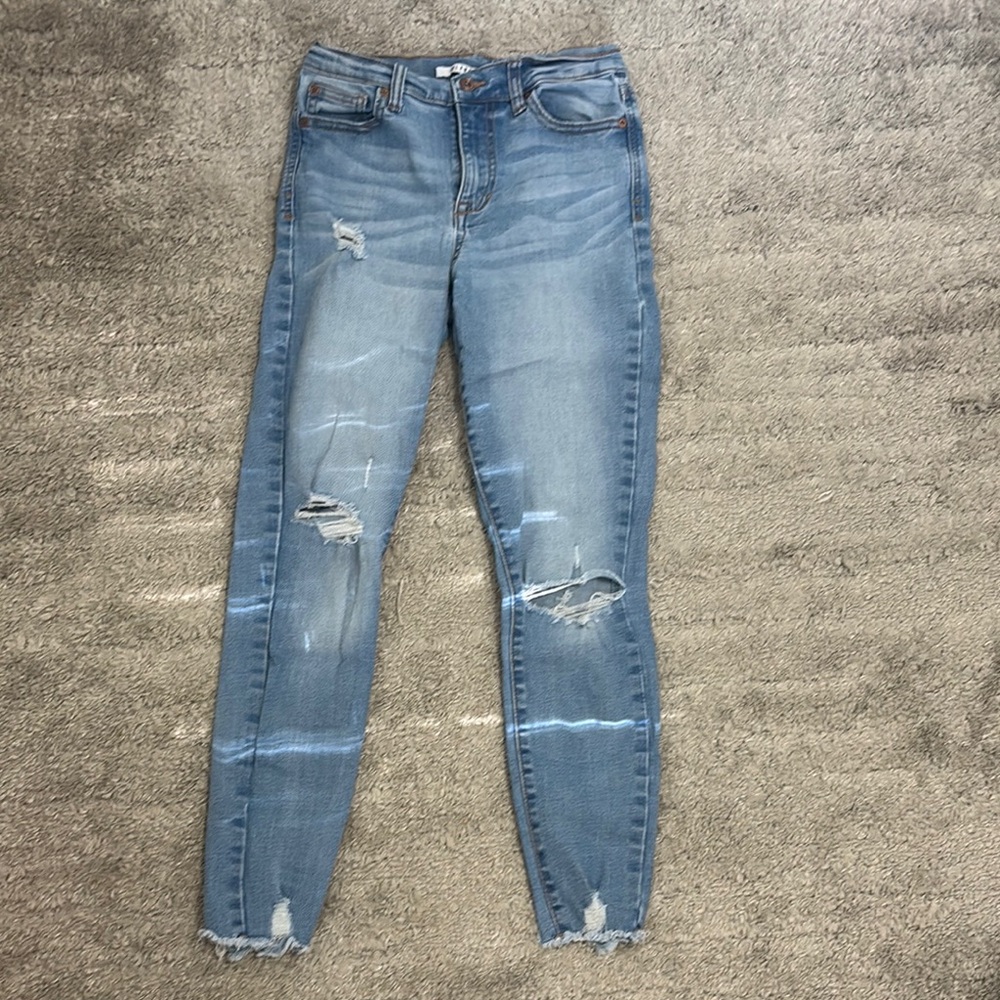 Distressed Blue Jeans
